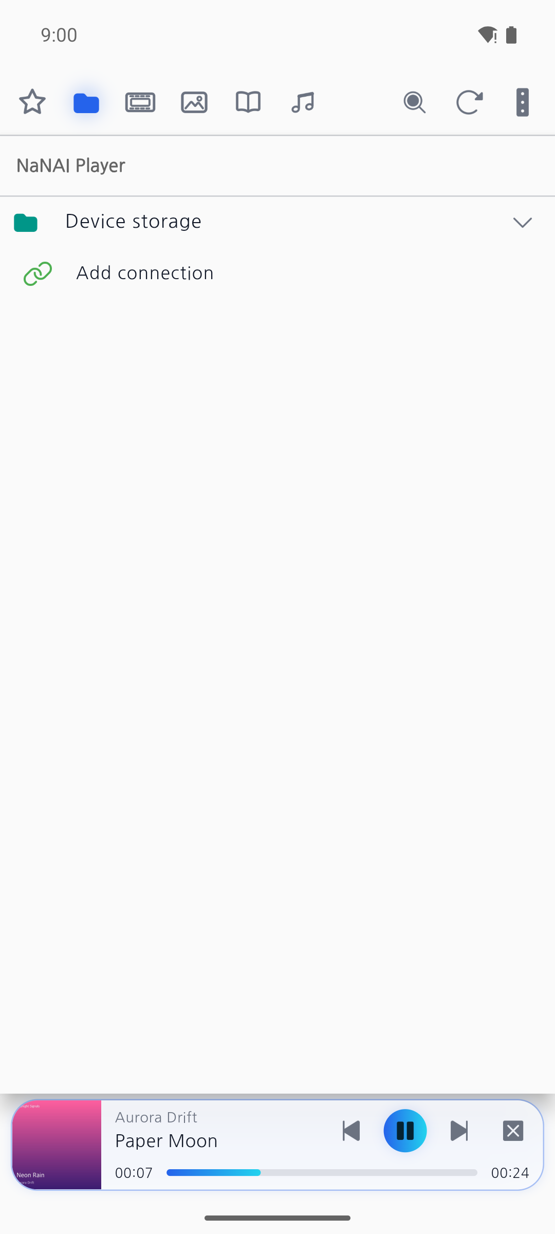 Background playback mini-player docked at the bottom